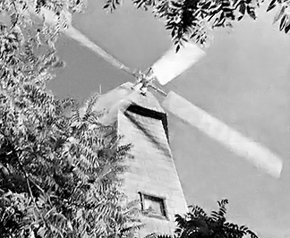 Devon Tassen's windmill house generates all the electricity his family needs at wind speeds as low as seven or eight mph.
